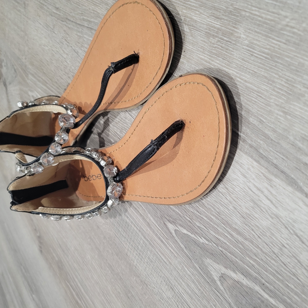 Bebe Black and Tan T-Strap Sandals with Metallic Finish